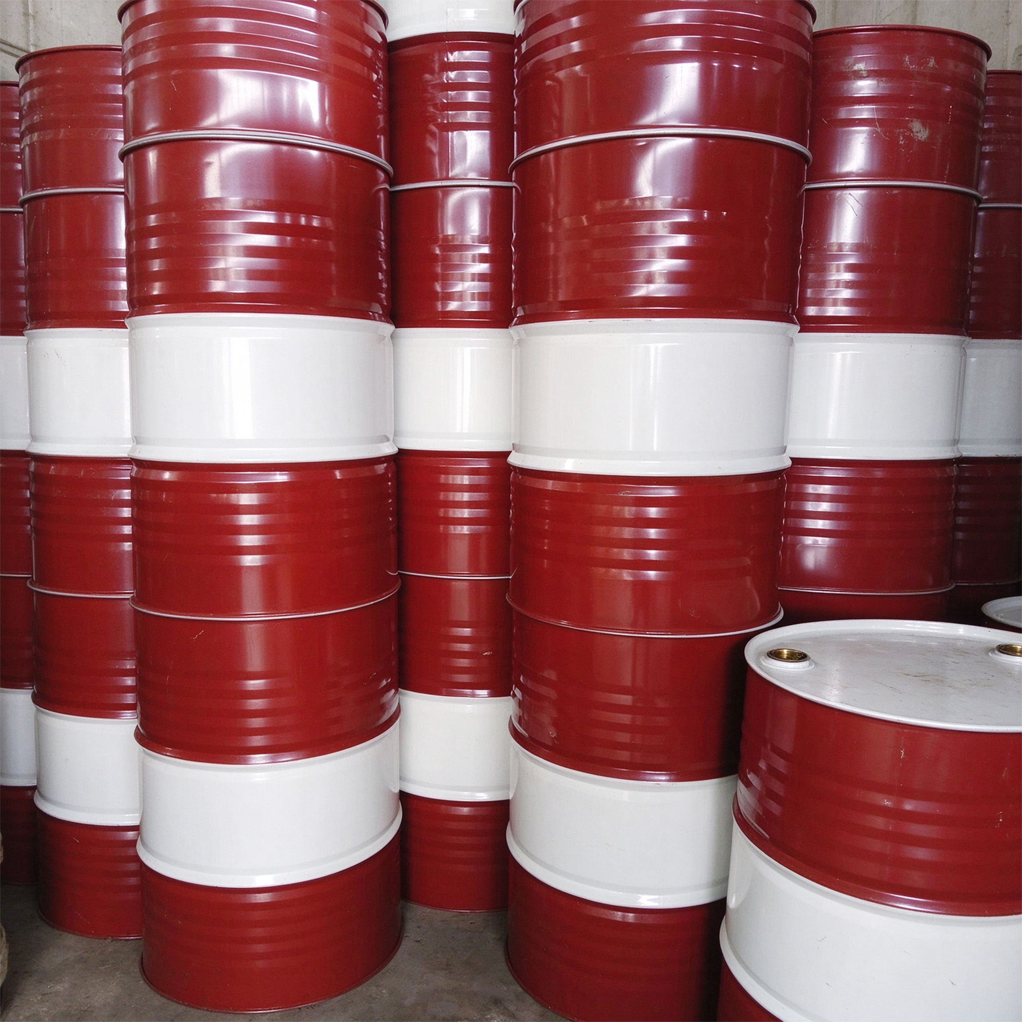 Red and white steel drums from the supplied packaging photographs