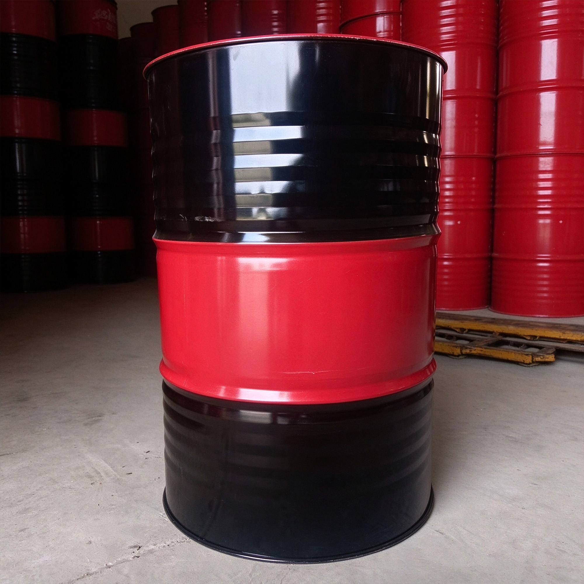Black and red steel drum from the supplied packaging photographs