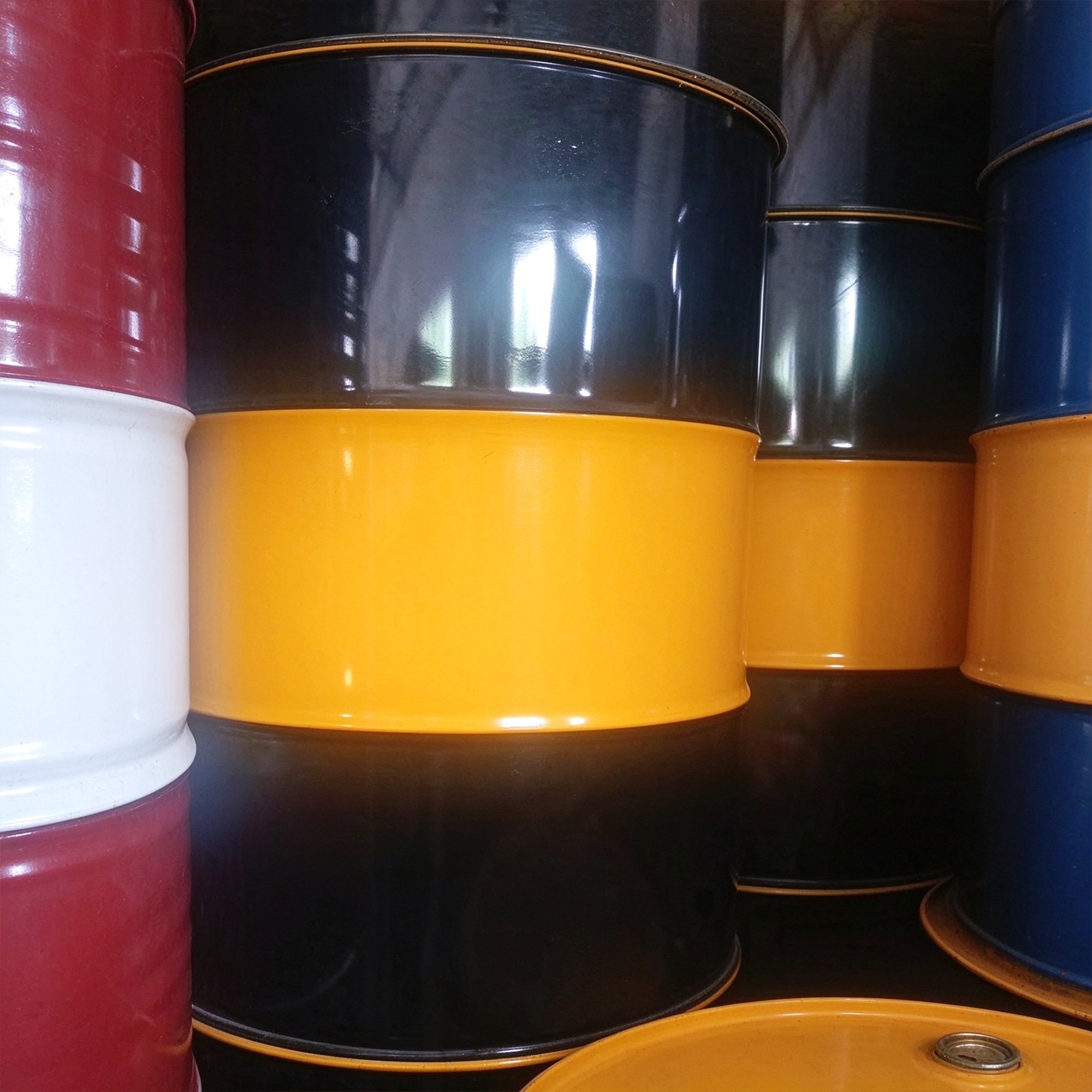 Black and yellow steel drums from the supplied packaging photographs